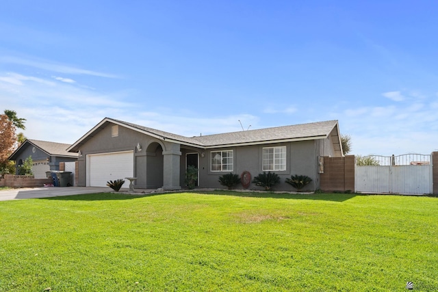 ranch-style house featuring a garage and a front lawn