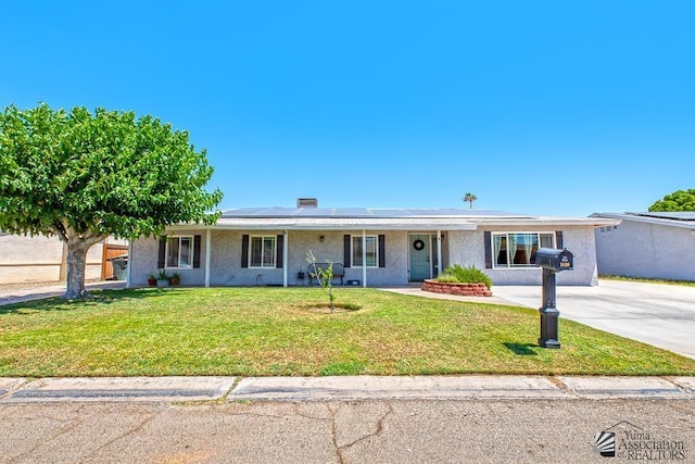 1830 W Allen St, Yuma, AZ 85364 - single story home featuring roof mounted solar panels, a front lawn, covered porch, and stucco siding
