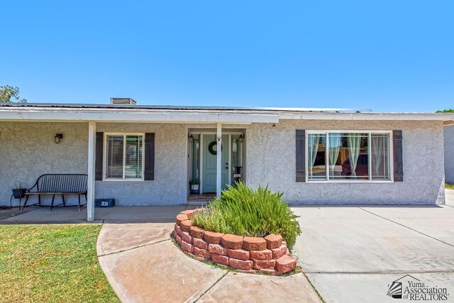 1830 W Allen St, Yuma, AZ 85364 - ranch-style home with stucco siding and covered porch
