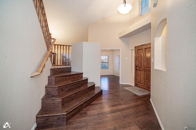 2640 S Barkley Ranch Ave, Yuma, AZ 85364 - entryway with a towering ceiling, stairway, wood finished floors, and baseboards