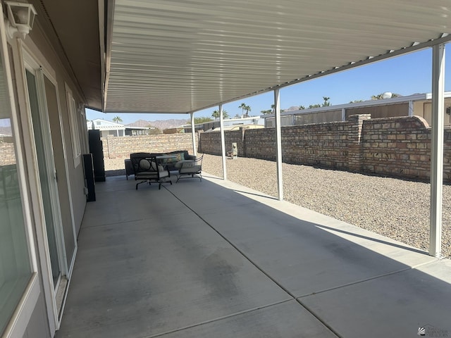 13624 E 47th St, Yuma, AZ 85367 - view of patio with a fenced backyard and an outdoor hangout area