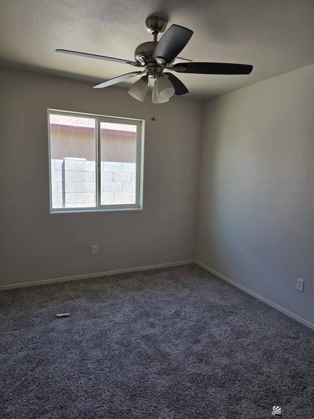 3822 E San Francisco St, San Luis, AZ 85336 - empty room featuring carpet flooring, a textured ceiling, and ceiling fan