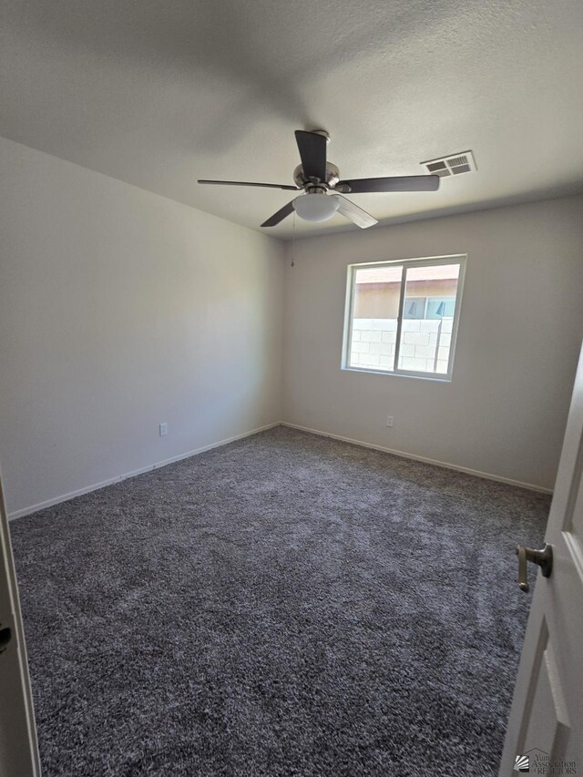 3822 E San Francisco St, San Luis, AZ 85336 - carpeted empty room with visible vents, a ceiling fan, and baseboards