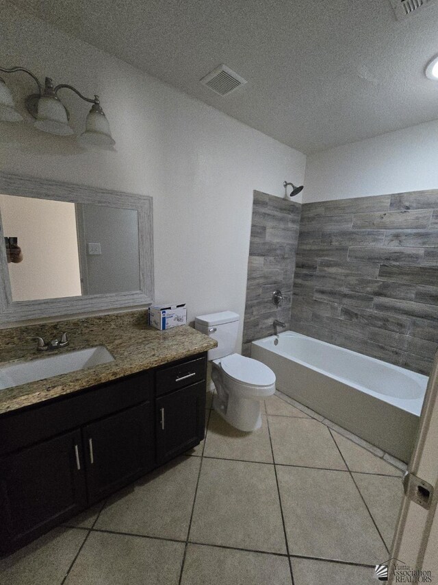 3822 E San Francisco St, San Luis, AZ 85336 - bathroom featuring tile patterned flooring, vanity, toilet, bathing tub / shower combination, and visible vents