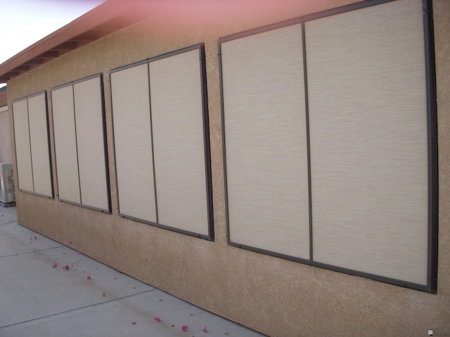 12650 E 46th St, Yuma, AZ 85367 - view of side of home featuring stucco siding