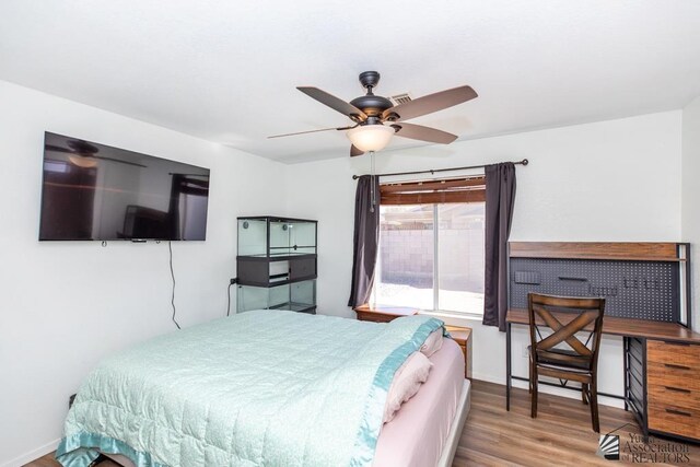 bedroom featuring wood finished floors
