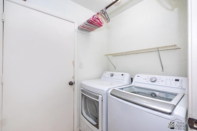 laundry room featuring laundry area and independent washer and dryer