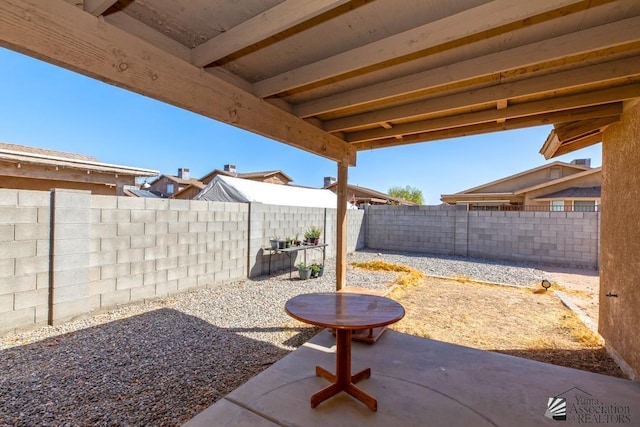 view of patio with a fenced backyard