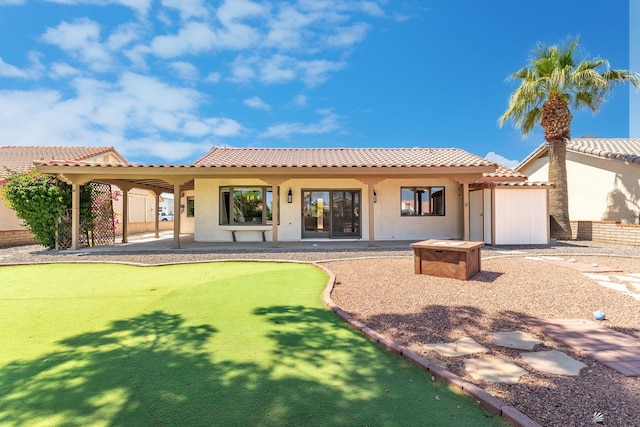 12500 E Del Rico, Yuma, AZ 85367 - rear view of house featuring a tiled roof, a patio area, and stucco siding