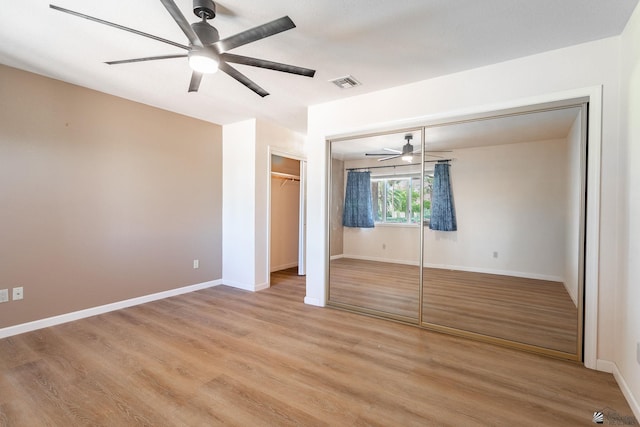 12500 E Del Rico, Yuma, AZ 85367 - unfurnished bedroom featuring visible vents, baseboards, and light wood-type flooring