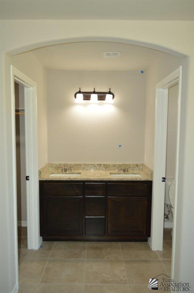 13132 E 55th Ln, Yuma, AZ 85367 - full bathroom featuring double vanity