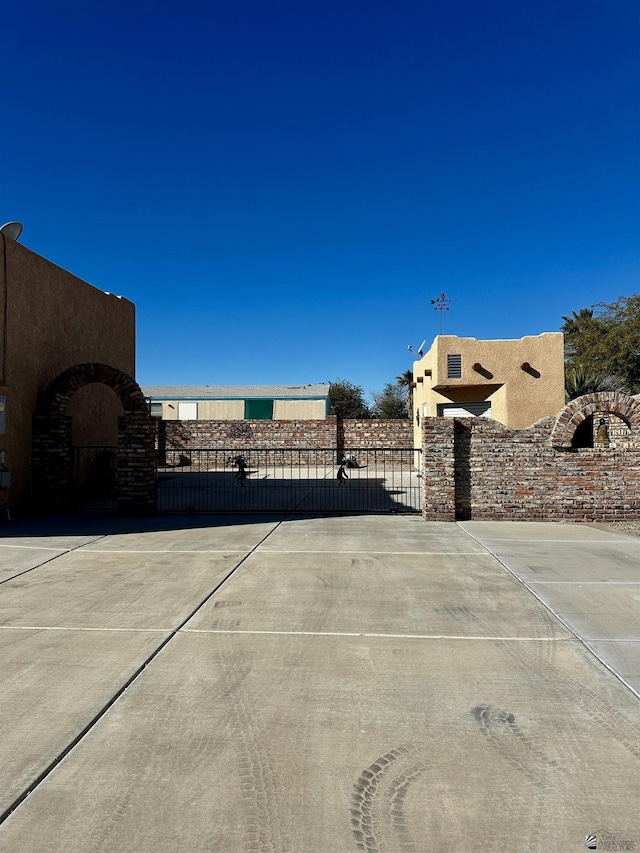 12696 E 45th Ln, Yuma, AZ 85367 - view of patio with fence and a gate