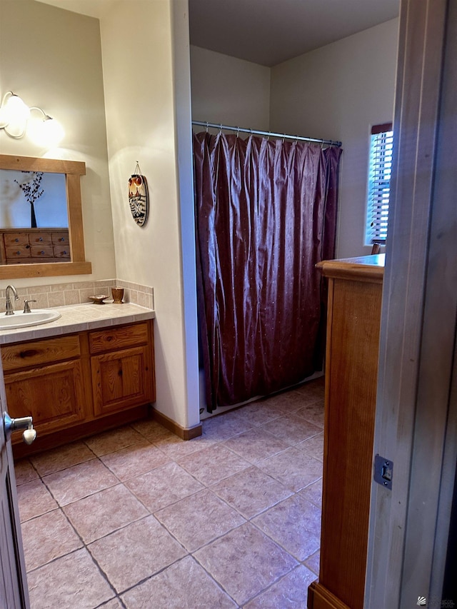 12696 E 45th Ln, Yuma, AZ 85367 - bathroom featuring curtained shower, tile patterned flooring, and vanity