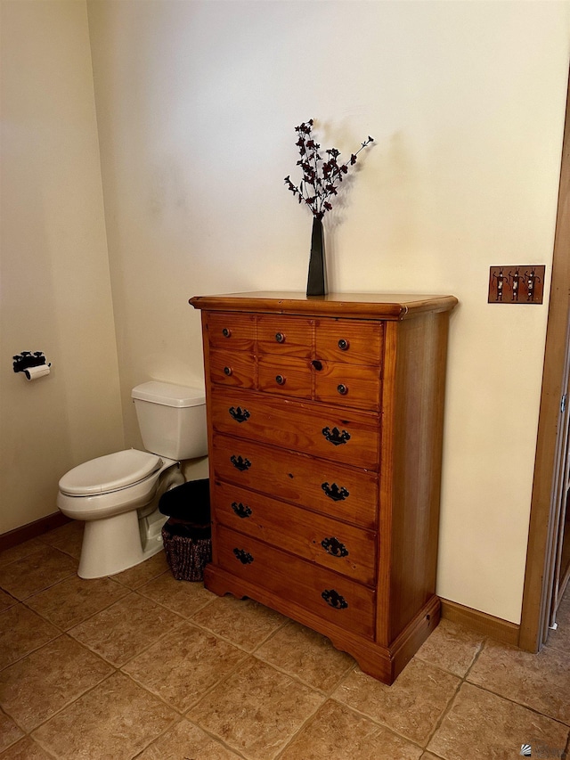 12696 E 45th Ln, Yuma, AZ 85367 - bathroom featuring baseboards, tile patterned floors, and toilet
