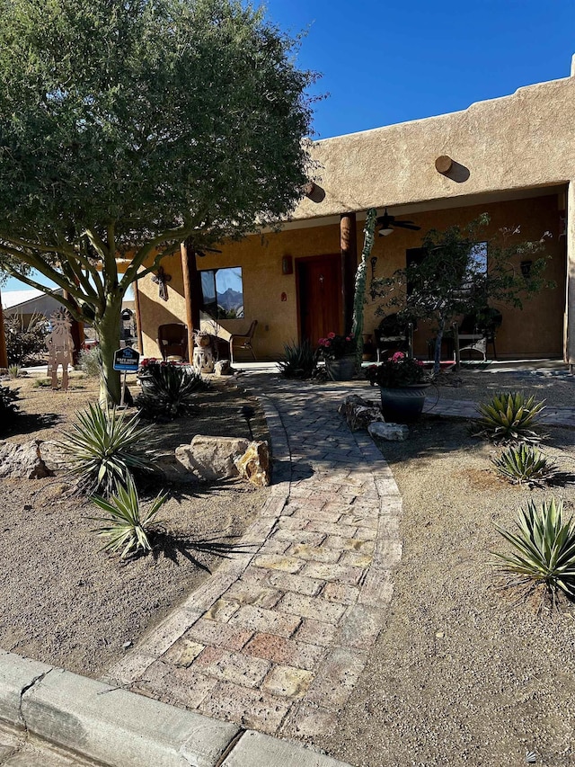 12696 E 45th Ln, Yuma, AZ 85367 - back of property with a ceiling fan and a patio area