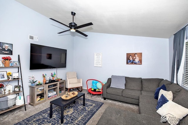 543 E 25th St, Yuma, AZ 85365 - living room with carpet floors and a ceiling fan