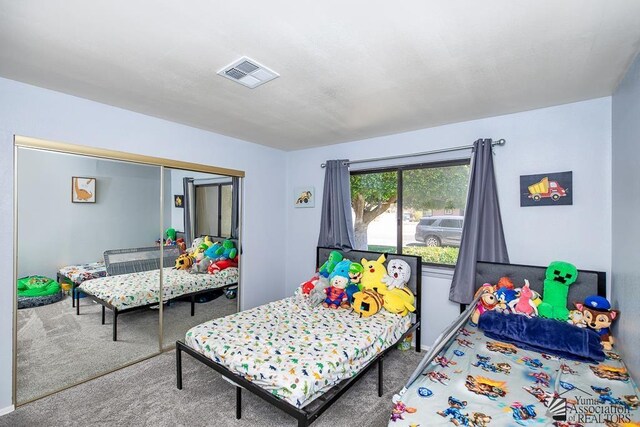 543 E 25th St, Yuma, AZ 85365 - bedroom featuring carpet floors and a closet