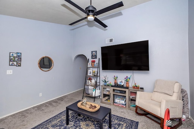 543 E 25th St, Yuma, AZ 85365 - living area with carpet floors, ceiling fan, and arched walkways