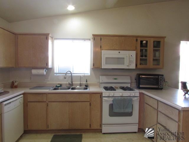 10646 S Via Salida, Yuma, AZ 85367 - kitchen with white appliances, a sink, light countertops, and glass insert cabinets
