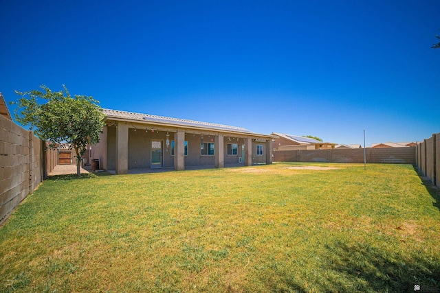 4387 W 24th Pl, Yuma, AZ 85364 - rear view of property with stucco siding and a fenced backyard