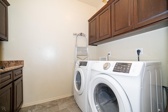 4387 W 24th Pl, Yuma, AZ 85364 - washroom with washer and clothes dryer and cabinet space