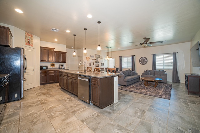 4387 W 24th Pl, Yuma, AZ 85364 - kitchen featuring stainless steel dishwasher, open floor plan, freestanding refrigerator, a ceiling fan, and recessed lighting