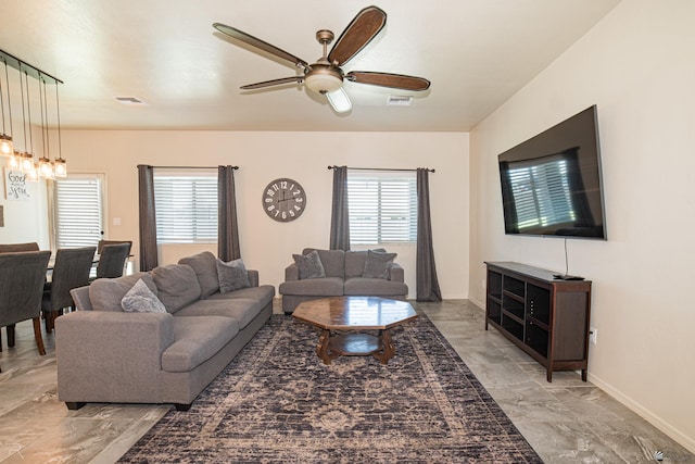 4387 W 24th Pl, Yuma, AZ 85364 - living area featuring light marble finish flooring and a ceiling fan