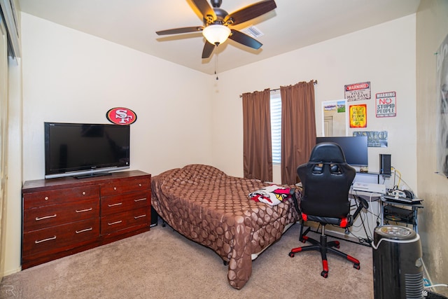 4387 W 24th Pl, Yuma, AZ 85364 - bedroom featuring carpet floors, a desk, and a ceiling fan