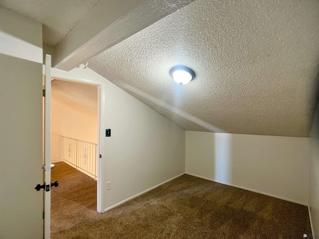 1700 S Crowder Ave, Yuma, AZ 85364 - additional living space with a textured ceiling and carpet flooring