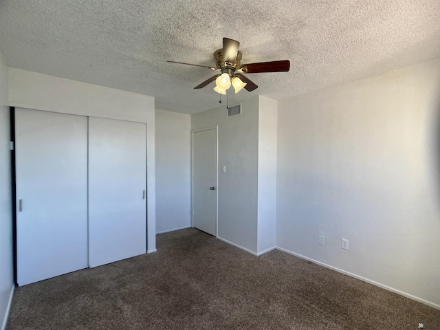 1700 S Crowder Ave, Yuma, AZ 85364 - unfurnished bedroom featuring carpet floors, a closet, a textured ceiling, and ceiling fan