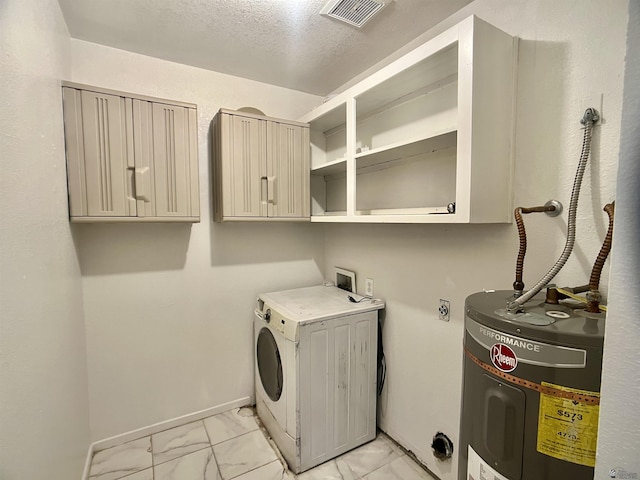 1700 S Crowder Ave, Yuma, AZ 85364 - washroom featuring washer / clothes dryer, water heater, light marble finish flooring, cabinet space, and a textured ceiling