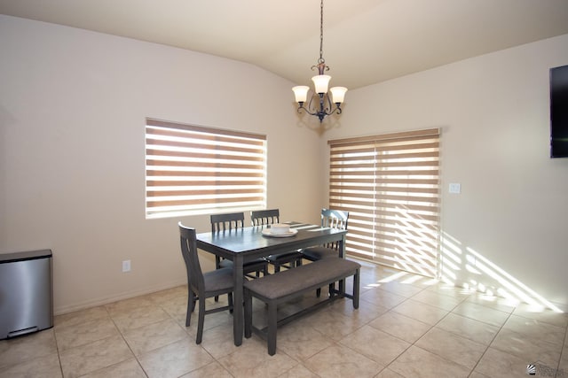 11681 E 33rd St, Yuma, AZ 85367 - dining room featuring a chandelier, light tile patterned flooring, and lofted ceiling