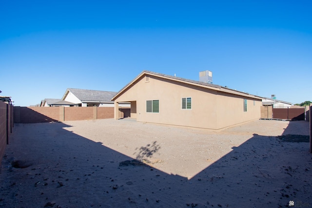 11681 E 33rd St, Yuma, AZ 85367 - back of house with a fenced backyard and stucco siding