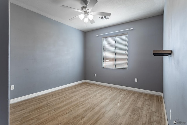 12170 E 33rd Pl, Yuma, AZ 85367 - spare room featuring light wood finished floors, a ceiling fan, and baseboards
