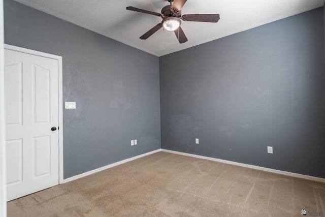 12170 E 33rd Pl, Yuma, AZ 85367 - carpeted spare room featuring a ceiling fan and baseboards