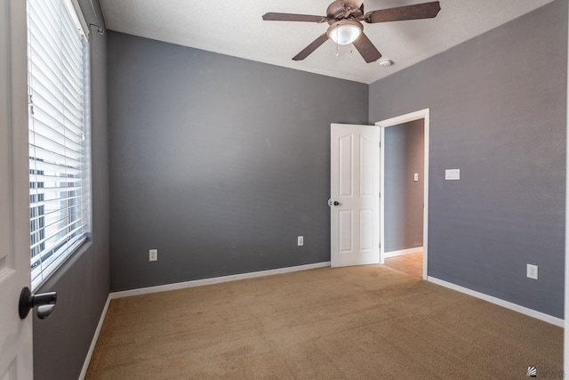 12170 E 33rd Pl, Yuma, AZ 85367 - spare room featuring ceiling fan, light colored carpet, baseboards, and a smoke detector