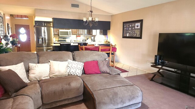 living room with an inviting chandelier, visible vents, light carpet, light tile patterned floors, and vaulted ceiling
