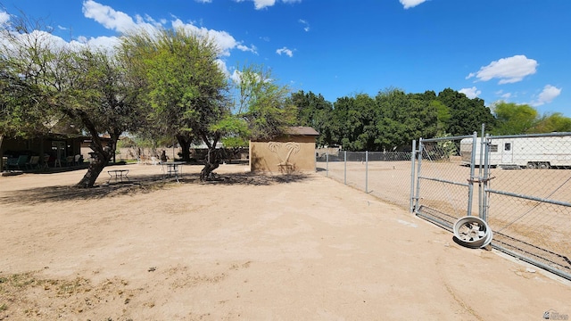 view of yard with a gate and fence