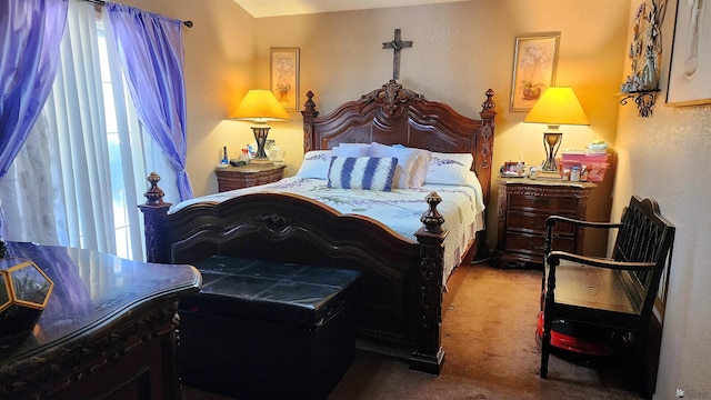 carpeted bedroom with multiple windows