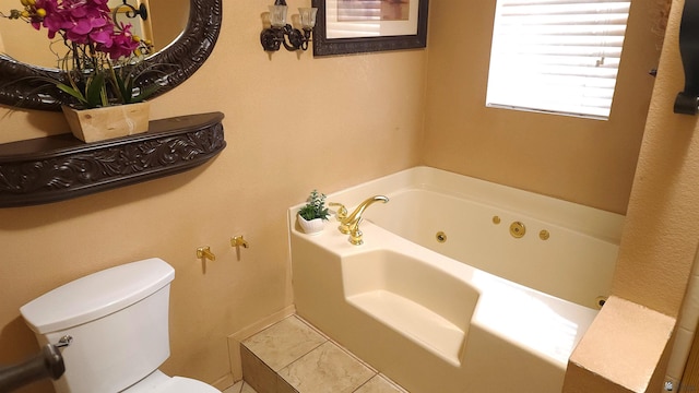 full bathroom with a whirlpool tub and toilet
