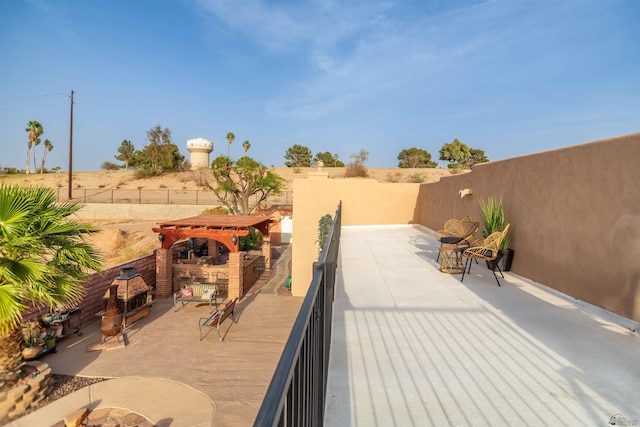 view of patio / terrace with fence