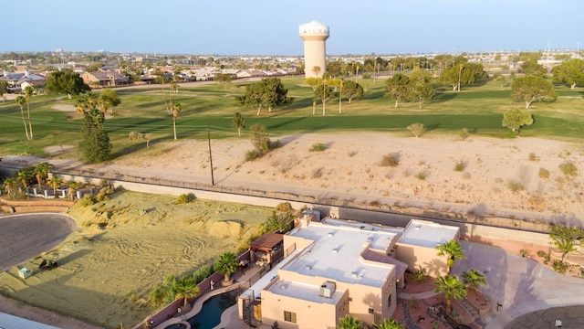 bird's eye view with view of golf course and a residential view