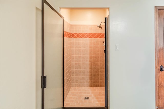 bathroom featuring a stall shower