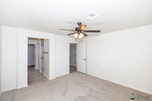 12546 E 51st Pl, Yuma, AZ 85367 - unfurnished bedroom with visible vents, a ceiling fan, carpet, and baseboards