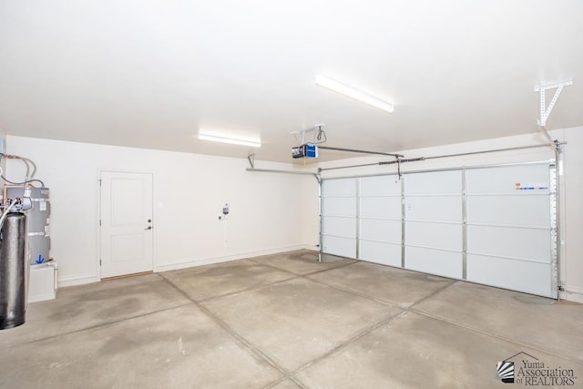 12546 E 51st Pl, Yuma, AZ 85367 - garage with baseboards and a garage door opener