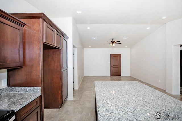 12546 E 51st Pl, Yuma, AZ 85367 - kitchen with light stone countertops, baseboards, recessed lighting, a ceiling fan, and light tile patterned floors