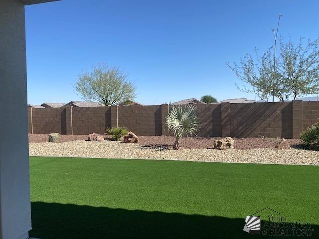 4595 S Villa Serena Drive Model Home Not For Sale, Yuma, AZ 85365 - view of yard featuring fence