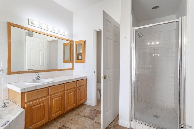 3481 W 27th Ln, Yuma, AZ 85364 - full bathroom with a shower stall, vanity, toilet, and a garden tub