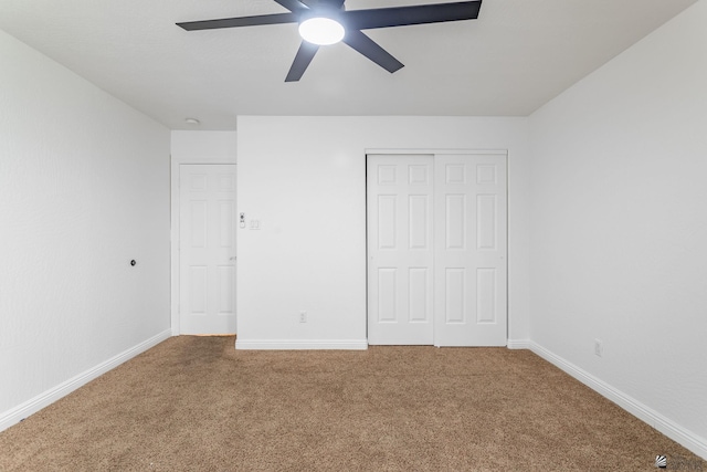 3481 W 27th Ln, Yuma, AZ 85364 - unfurnished bedroom with carpet, a closet, baseboards, and a ceiling fan