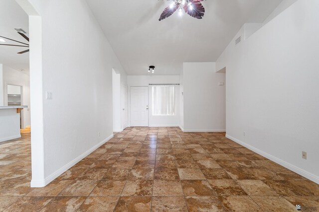 3481 W 27th Ln, Yuma, AZ 85364 - empty room with ceiling fan, baseboards, and stone finish flooring